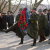 Laying wreaths to the monument of the dead police officers.&nbsp;[Press for large view]