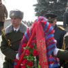 Laying wreaths to the monument of the dead police officers.&nbsp;[Press for large view]