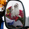 Participant(s) of the �Santa Clauses and Snow Maidens� march.&nbsp;[Press for large view]