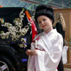 Visitors of  Honda company stand were welcomed by girls in national costumes.&nbsp;[Press for large view]
