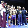 The Belarusian coaching team (left) and the US coaching team (right)&nbsp;[Press for large view]