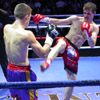 Andrey Kotsur (red shorts) and Dan Rallings (blue shorts), a dangerous blow&nbsp;[Press for large view]